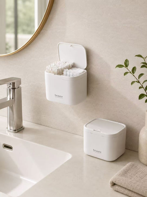 White cotton swab organizer shown wall mounted and standing on a bathroom counter