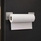 Silver two-piece magnetic paper towel holder on a black refrigerator