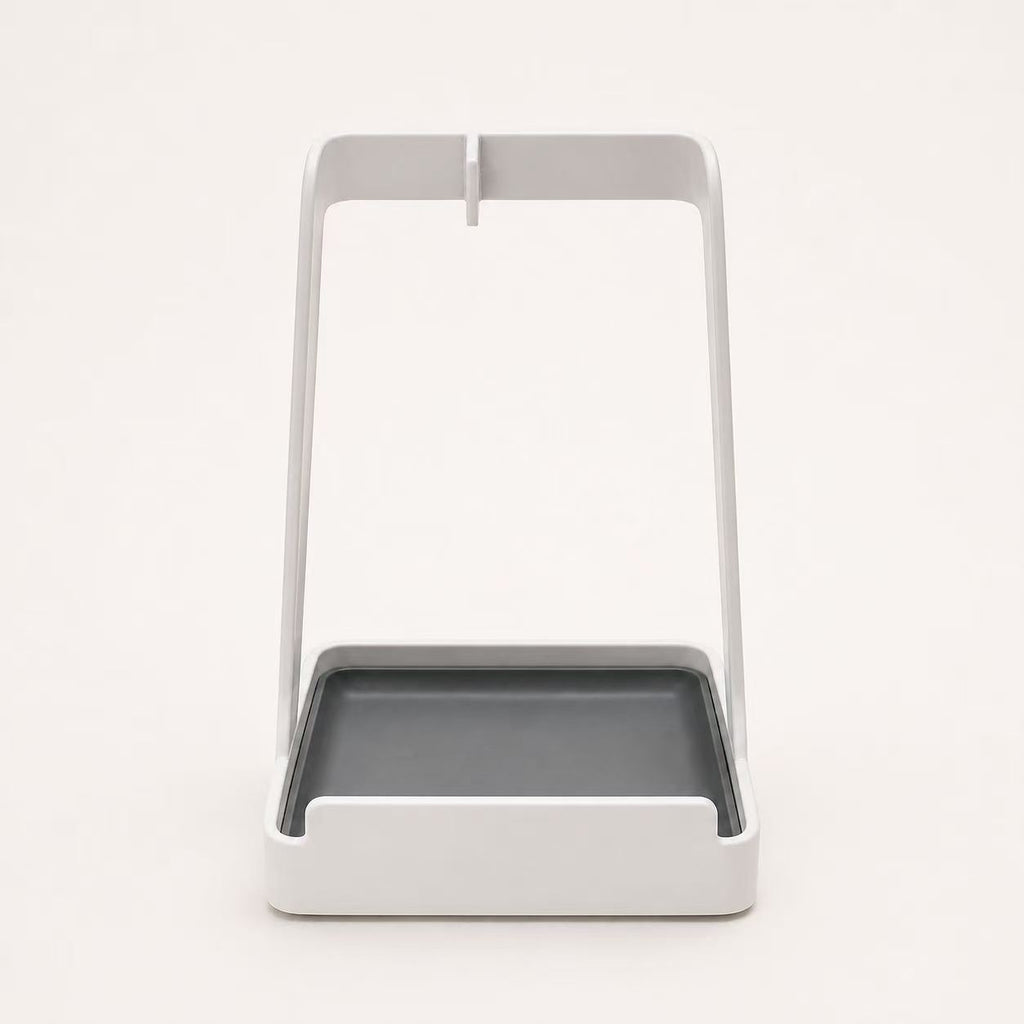 Front view of white multifunctional kitchen countertop stand with gray drip tray