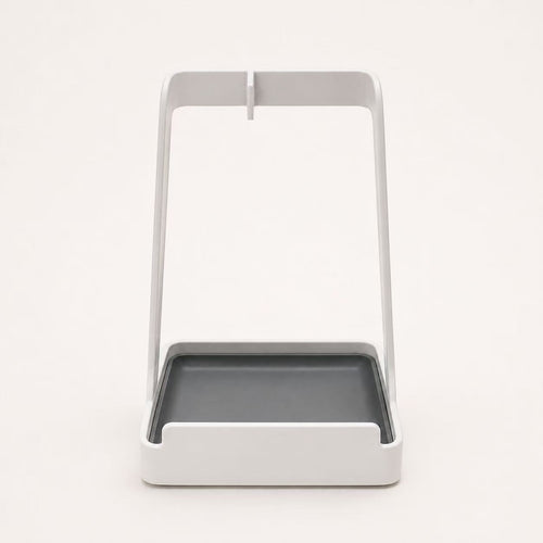 Front view of white multifunctional kitchen countertop stand with gray drip tray