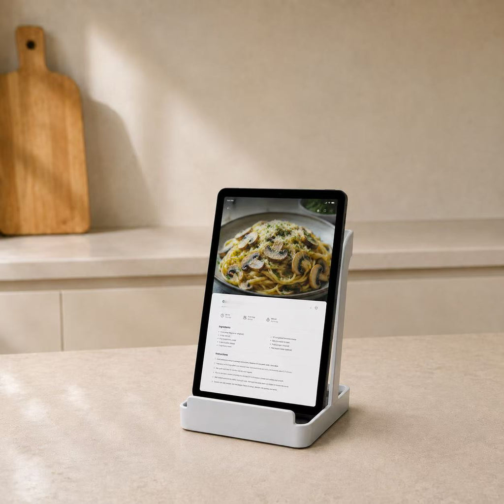 White multifunctional kitchen stand holding a tablet with a recipe
